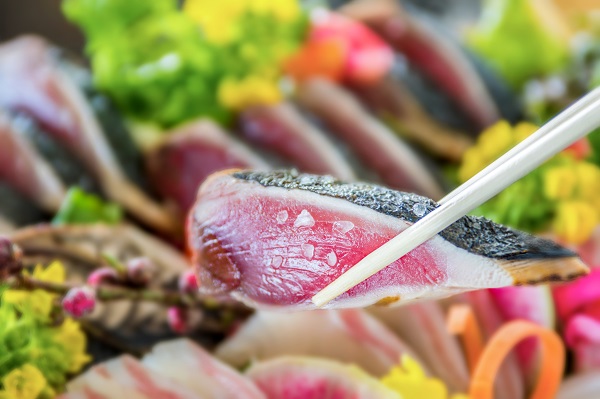 Katsuo no Tataki, a dish bonito is briefly seared on high heat, leaving the inside raw.